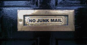 letter box in a door, no junk mail sign