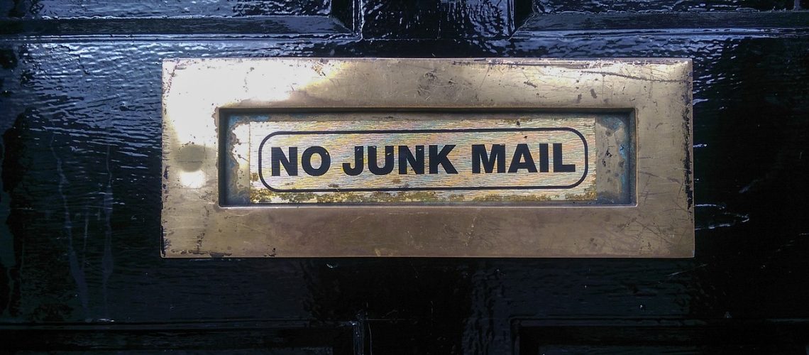 letter box in a door, no junk mail sign